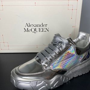 Alexander McQUEEN silver/holograph sneakers size11B.. New in original box.